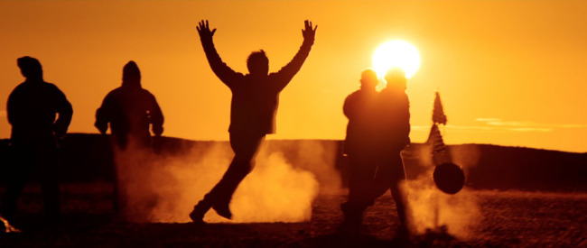 Soccer match in the setting sun